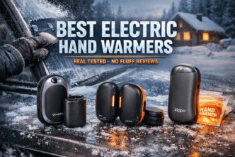 Alt text: Compact electric hand warmers displayed on snowy outdoor table with winter cabin in background.